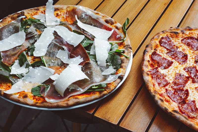 Colorful summer seasonal pizza with fresh vegetables